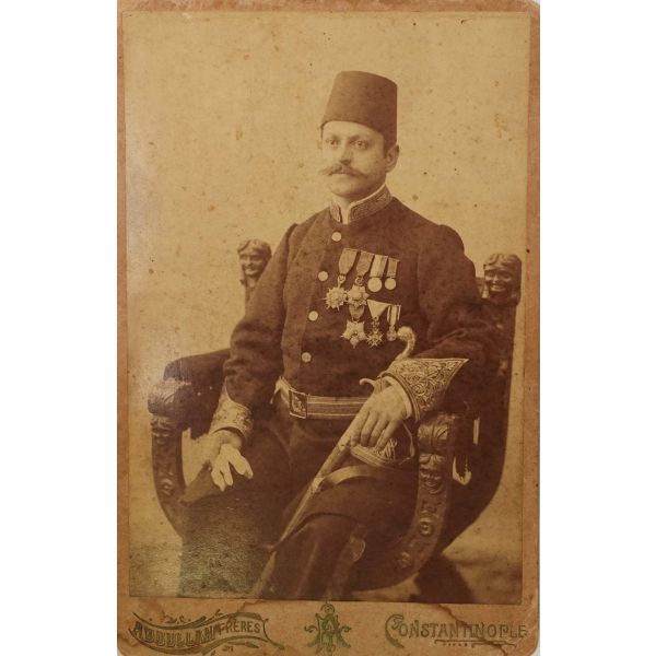 Bir Osmanlı paşasının, nişan ve madalyalar takılı üniforması ve kılıcıyla aldırdığı hatıra fotoğrafı, Abdullah Freres - Pera, Constantinople, 11x17 cm...