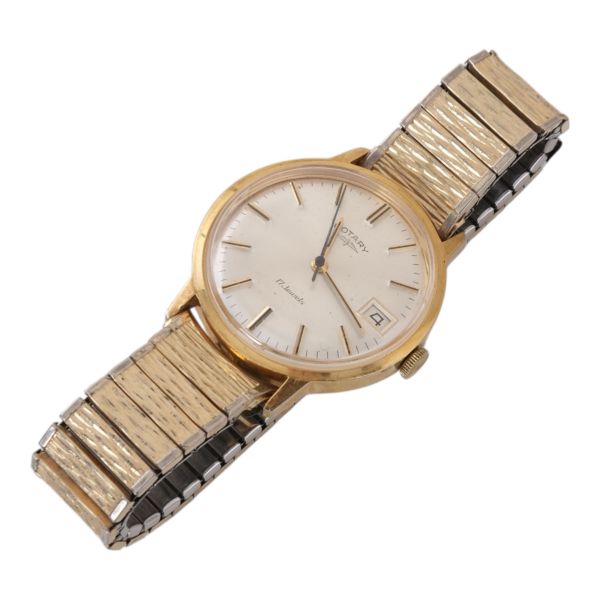 Rotary, Swiss Made, metal kordonlu, vintage erkek kol saati...